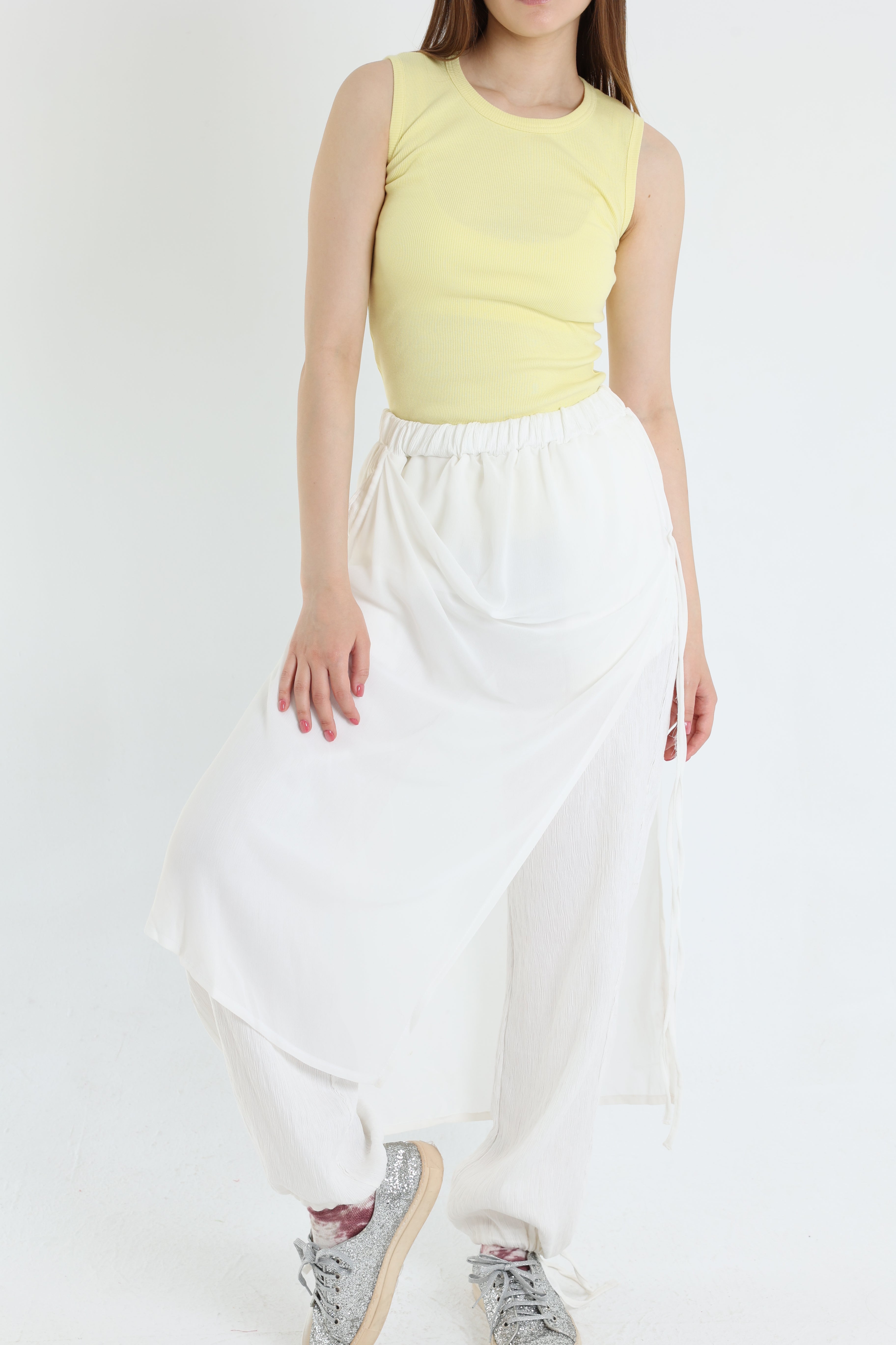 Off-white crepe pants with croise chiffon layer